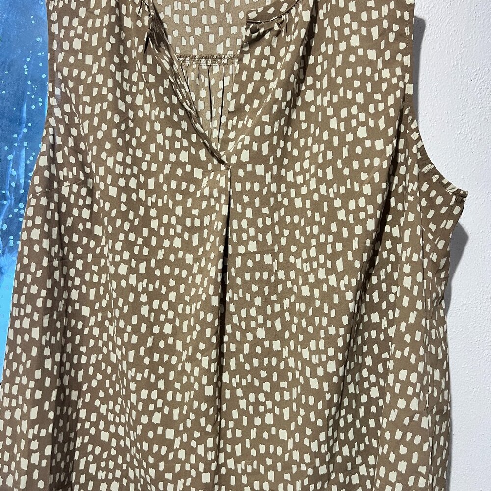Monday Fun tan and cream sleeveless dress shirt.